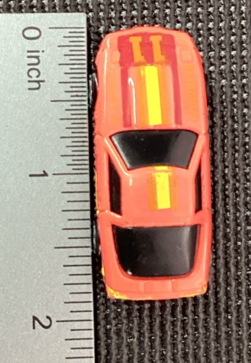Hot Wheels Corvette  1982 Orange w/ Yellow/Brown Stripe